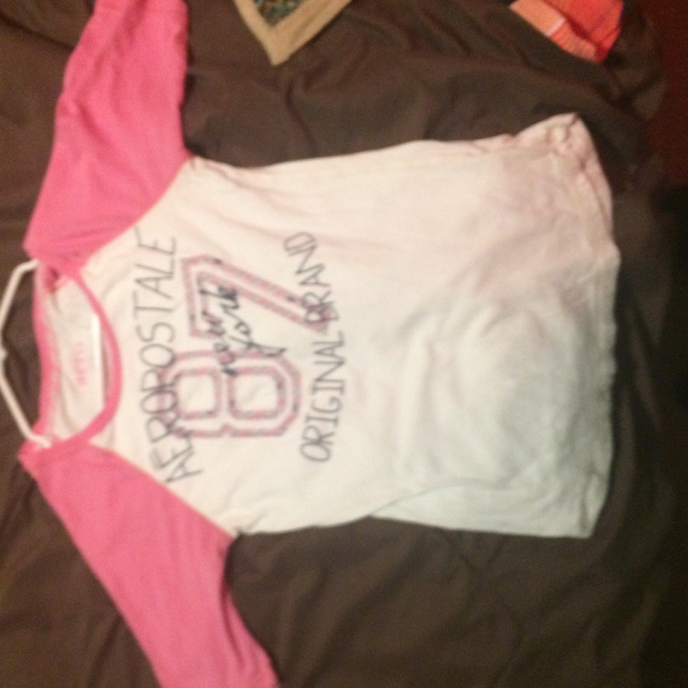 Several shirts name brand make offer